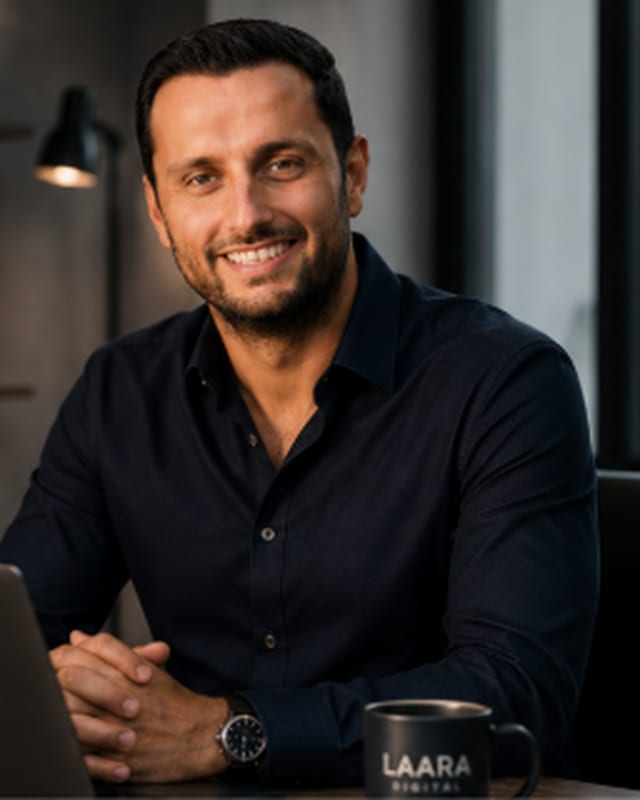 Cuneyt Candan, founder of Laara Digital, at his desk